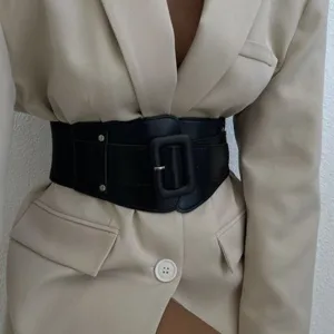 Wide black elastic waist belt detail showcasing square buckle design and textured PU leather.