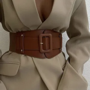 Women vintage wide elastic waist belt with square buckle, perfect for dresses and coats.