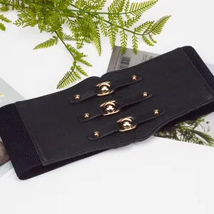 Wide black elastic waist belt detail view, stylish metal snap button buckle accessory.