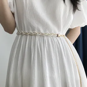 Elegant pearl waist chain for women, sweet metal belt accessory for dresses and sweaters.