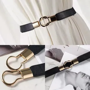 Stylish black elastic waist belt for women with sleek gold buckle, perfect for dresses and coats.