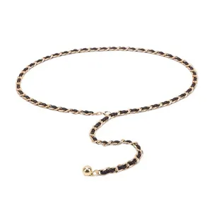 Elegant gold chain waist belt with black leather weave and metal ball charm for women dresses.