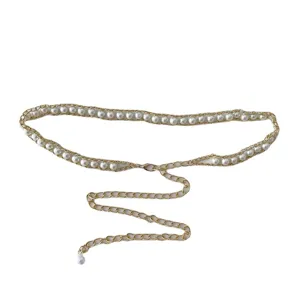 Elegant gold metal chain belt featuring white faux pearls, perfect sweet dress accessory.