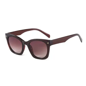 Chic square sunglasses for women with gradient lenses and stylish metal decor for sunny outdoor wear.