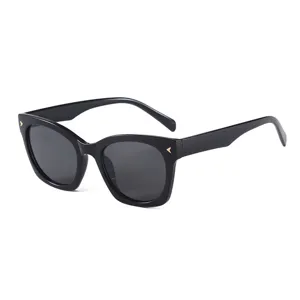 Stylish black square women sunglasses with UV protection, classic frame and gold metal decor.