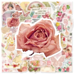 Close-up detail of vintage pink rose sticker with retro aesthetic collage background design.