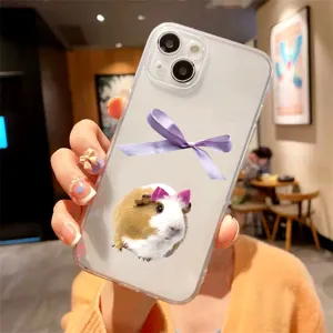 Clear phone case featuring a purple bow and cute guinea pig sticker design for daily use.