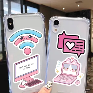 Detailed shot of clear phone cases decorated with cute tech and internet graffiti stickers.