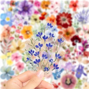 Transparent PET floral sticker featuring blue pressed flowers, perfect for journaling and crafts.