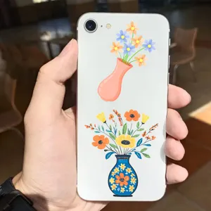 Detailed view of decorative floral vase stickers on phone back, fresh Nordic art design style.