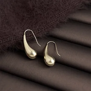 Elegant coffee gold geometric teardrop earrings, smooth minimalist design for daily wear.