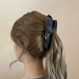 Retro elegant grey fabric bow banana clip for women, vertical hair claw for stylish ponytails.