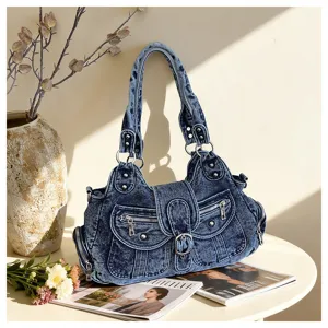 Vintage denim shoulder bag with multiple pockets, large capacity casual tote for women.