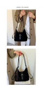 Detail view of the black convertible shoulder bag and backpack with buckle and chic tassel.