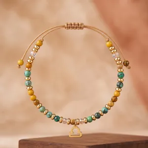 Bracelet de perles en pierre naturelle avec charm zodiaque Balance et cordon ajustable.
