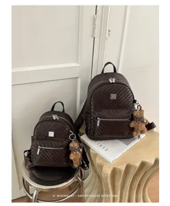 Retro woven backpack for women, large capacity casual commuter school bag with cute bear charm.