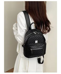 Stylish woven backpack for women, large capacity retro casual daypack for college commute.