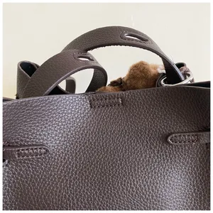 Brown pebbled leather shoulder bag detail, stylish women handbag, casual daily use chic purse.