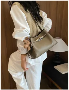 Stylish women shoulder crossbody bag detail view, premium leather texture, elegant daily wear.
