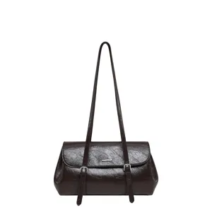 Dark brown vintage leather shoulder bag for women, chic commuting underarm bag with straps.