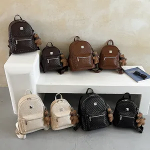 Casual woven leather backpack for women, large capacity vintage college school bag.