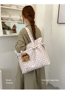 Polka dot canvas tote bag for women, large capacity shoulder bag with cute bear pendant.