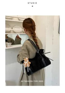 Black suede tote bag for women, large capacity casual shoulder bag with bear charm for work.