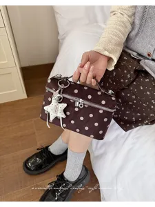 Vintage brown polka dot velvet handbag with star charm, elegant top handle tote bag.
