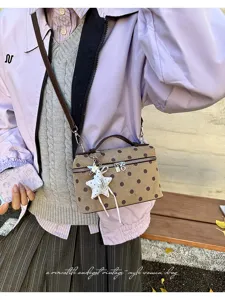Vintage sweet polka dot vanity handbag detail showing stylish retro design for women's daily commute.