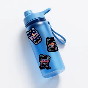Blue plastic water bottle featuring Japanese neon style cat and torii graffiti stickers.