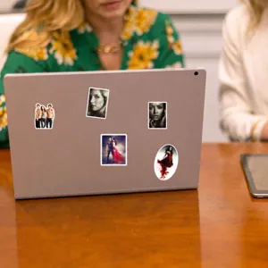Detailed view of The Vampire Diaries waterproof laptop stickers displayed on silver computer.