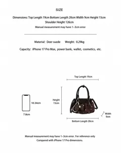Tabla de tallas detallada y dimensiones precisas del bolso de hombro con lunares.