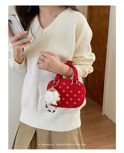 Red polka dot bowling handbag, vintage suede shoulder bag, stylish commuter tote bag.