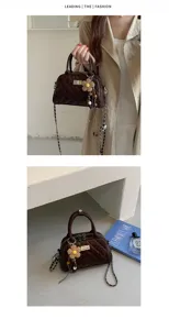 Detail view of the elegant quilted chain crossbody bag showcasing refined craftsmanship, premium texture, and chic metal turn-lock design in a stylish lifestyle setting.