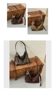 Gedetailleerd overzicht van de stijlvolle dames schoudertas met zacht vintage ontwerp.