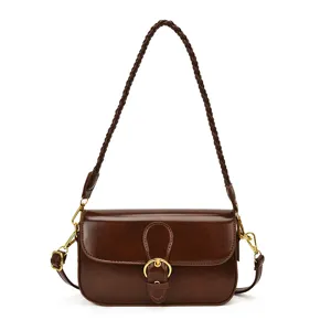 Braune Retro Leder Schultertasche für Damen, stilvolle Achseltasche mit geflochtenem Riemen.