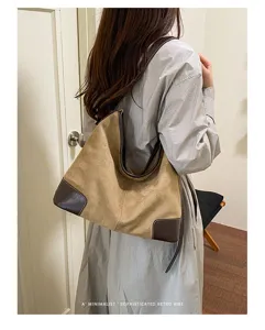 Retro suède schoudertas voor dames, grote casual shopper tas in comfortabele herfststijl.