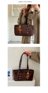 Detail view of the retro brown suede tote bag featuring metallic rivets and cute wooden bead pendant.