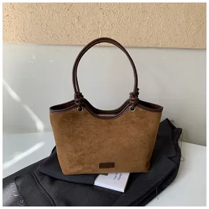 Brown suede tote bag with knotted handles and vintage style for women daily casual use.