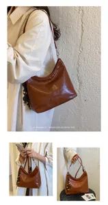 Minimalist retro brown leather underarm bag for women, chic casual shoulder dumpling handbag.