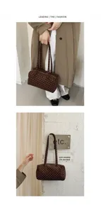 Détail de sac boston à pois marron, sac à épaule vintage décontracté et élégant.