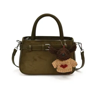 Dark green matte handbag with cute puppy charm, stylish shoulder crossbody bag for women.