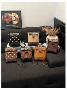 Stylish vintage bucket bags with unique toggle closure, versatile fashion crossbody bags for women.
