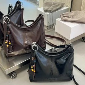 Women's PU Leather Dumpling Shoulder Bag Simple Niche Versatile Casual Underarm Handbag With Pendant 2026 Autumn Style