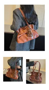Fashion brown PU leather tote shoulder bag with cute bear pendant, commuter style daily use.