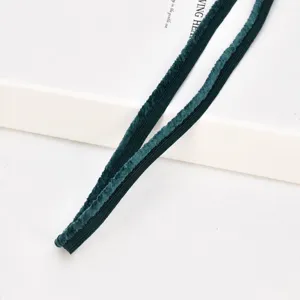 Dark green plush piping trim 1cm wide detail shot for DIY craft accessories and sewing projects.
