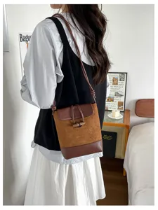 Brown contrast bucket bag shoulder crossbody bag, stylish toggle closure casual daily use.