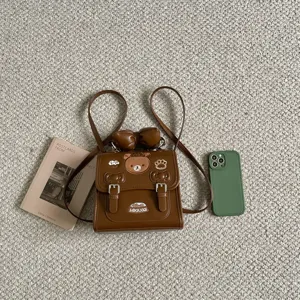 Stijlvolle bruine mini rugzak met strik, veelzijdige crossbody schoudertas voor dagelijks gebruik.