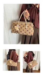 Stylish brown polka dot shoulder tote bag with cute bear charm for daily commuting and lifestyle