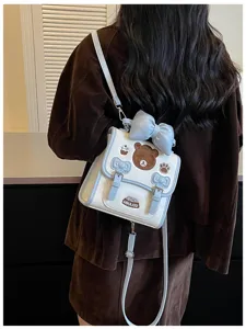 Stijlvolle mini rugzak voor dames wit blauw schattige beer met strik crossbody tas.